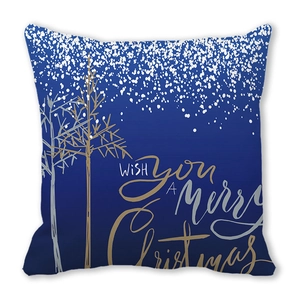 Detail of navy blue Christmas pillowcase with gold tree patterns and festive typography