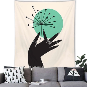 Minimalist Nordic geometric wall tapestry with abstract hand and dandelion design on white wall