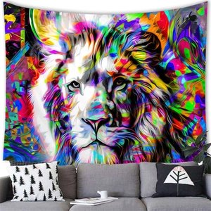 Detail of colorful abstract lion wall tapestry hanging above a modern living room sofa