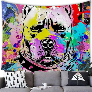 Colorful pop art bulldog tapestry on white wall above a modern grey sofa set