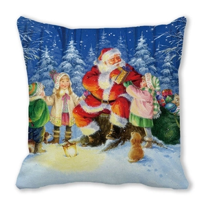 Close-up of a Christmas pillow featuring Santa and kids in a snowy forest scene