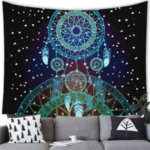 Detail of dreamcatcher tapestry hanging above a grey sofa in a cozy modern living room