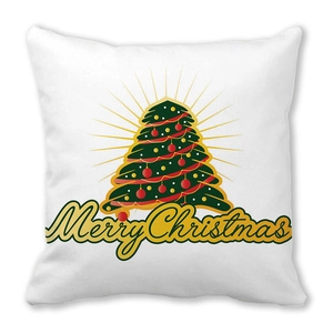 Detail of white square cushion with Christmas tree print and Merry Christmas text