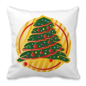 Close-up of peach skin fabric and Christmas tree illustration on festive cushion