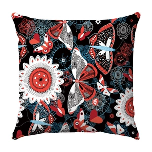 Detail of butterfly and floral print on plush decorative sofa cushion cover