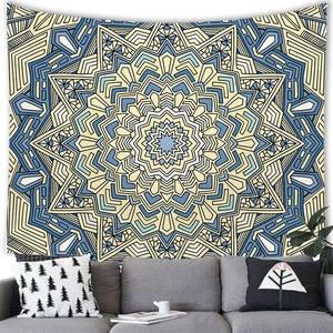 Detail of bohemian mandala tapestry with radial patterns in navy and cream tones