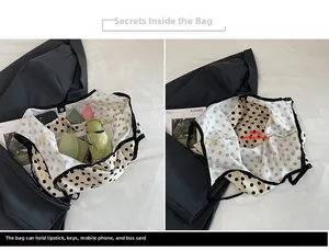 Internal view of the polka dot tote bag showing compartments for phone and daily items