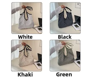 Detailed grid view of polka dot tote bags in white, black, khaki, and green colors