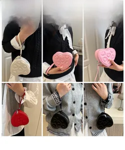 Detail view of heart-shaped PU leather mini crossbody bags in four different colors