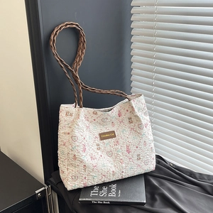 Chic white bubble textured tote bag with cute bear patterns and brown woven straps
