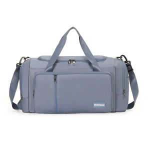 Blue travel bag detail showing water-resistant nylon fabric and durable zippers