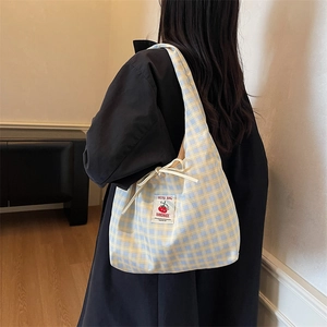 Japanese style yellow and blue plaid tote bag with tomato label and drawstring detail