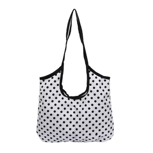 Minimalist white canvas tote bag with black polka dots and durable black straps