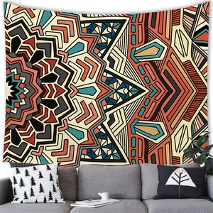 Bohemian geometric mandala tapestry wall hanging in brick red and teal for home decor
