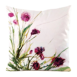 Close-up of watercolor floral pillowcase with purple flowers and satin-like texture