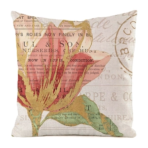 Detailed macro view of vintage watercolor floral linen pillowcase texture and pattern