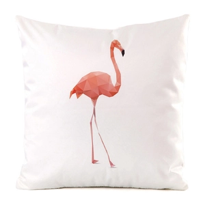 Close-up of pink low-poly flamingo pattern on smooth faux silk cushion cover