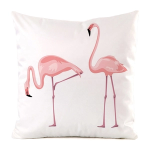 Detail shot of a square white satin pillowcase featuring pink flamingo bird patterns
