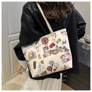 Detail of canvas tote bag featuring vibrant Hong Kong theme illustrations and durable handles