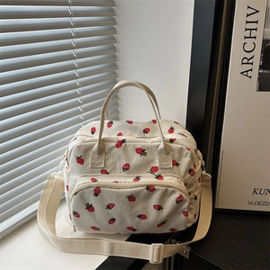 Chic corduroy tote bag with red strawberry print and adjustable shoulder strap for women