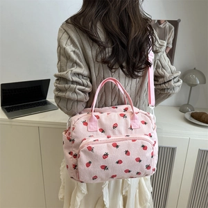 Pink corduroy strawberry hobo bag with adjustable shoulder strap for women