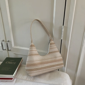 Chic woven striped hobo bag for women with beige and white patterns and shoulder strap
