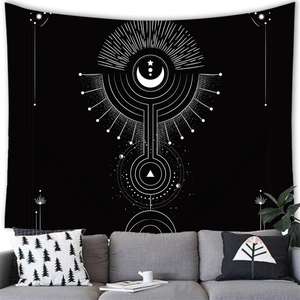 Minimalist black and white celestial tapestry featuring moon and star geometric patterns