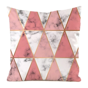 Macro view of geometric triangle decorative pillow cover with pink marble patterns