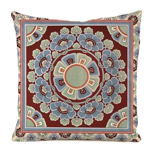 Detailed pattern of colorful mandala art on square satin decorative cushion cover