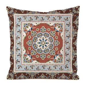Close-up of bohemian kaleidoscope pattern on high-quality faux silk cushion cover