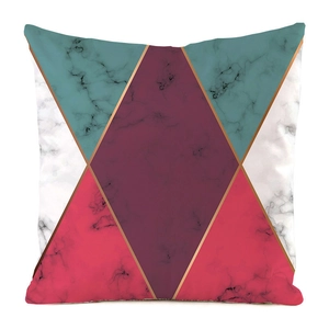 Detail of geometric faux silk pillow cover with marble texture and gold line accents