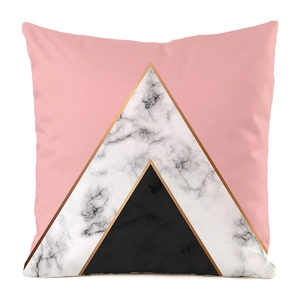 Detail of faux silk pillowcase with pink and white marble geometric triangle patterns
