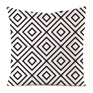 Detailed close-up of diamond geometric pattern on luxury faux silk cushion cover