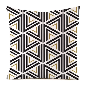 Macro detail of geometric triangle patterns on luxury faux silk sofa cushion cover