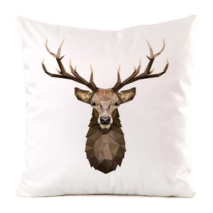 Detailed close-up of a square cushion cover with geometric reindeer head pattern print