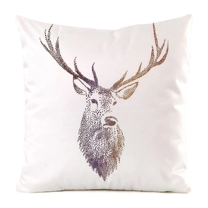 Macro detail of silk decorative cushion cover showing artistic colorful elk head pattern