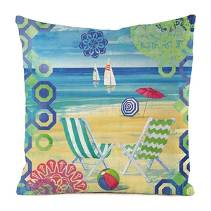 Detail of beach chair and sailboat pattern on a square faux silk cushion cover
