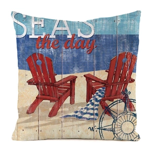 Detailed texture of beach theme cushion cover with red chairs and SEAS the day print