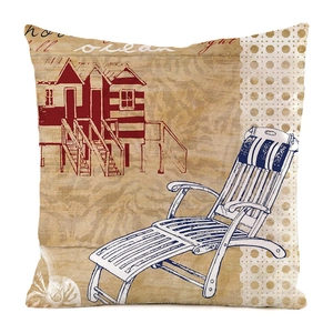 Detail of square cushion cover with vintage beach hut and ocean print on linen texture