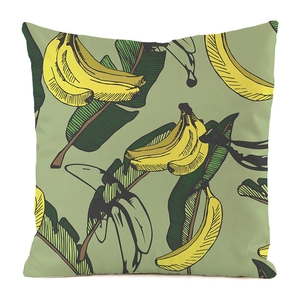 Detail of faux silk pillowcase featuring tropical banana and palm leaf hand-painted patterns