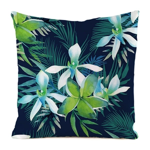 Detailed macro view of tropical orchid and palm leaf print on smooth faux silk fabric