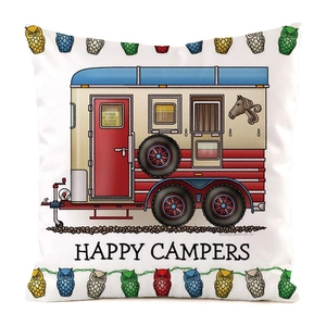 Detail eines Seiden-Dekokissens mit Vintage-Wohnmobil und Happy Campers Schriftzug