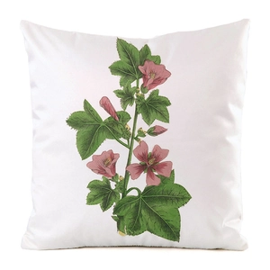 Detailed view of floral pattern cushion cover with pink blossoms and green leaves
