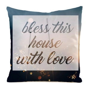Macro shot of faux silk cushion cover featuring 'bless this house with love' printing