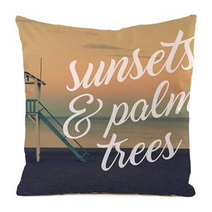 Detailed texture of square satin pillowcase with sunset palm tree print and typography