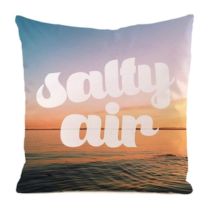 Detail of salty air typography on sunset ocean print square pillowcase fabric