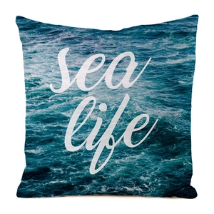 Detailed view of the woven fabric texture on a square cushion with Sea Life art