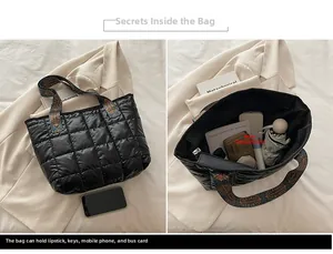 Grand sac cabas matelassé noir montrant l'espace intérieur et la bandoulière ethnique