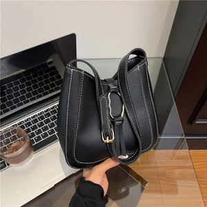 Black PU leather shoulder bag with white contrast stitching and gold metal buckle detail