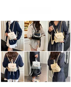 Detailed view of elegant mini bucket backpacks with lace trim and bow knot in four colors